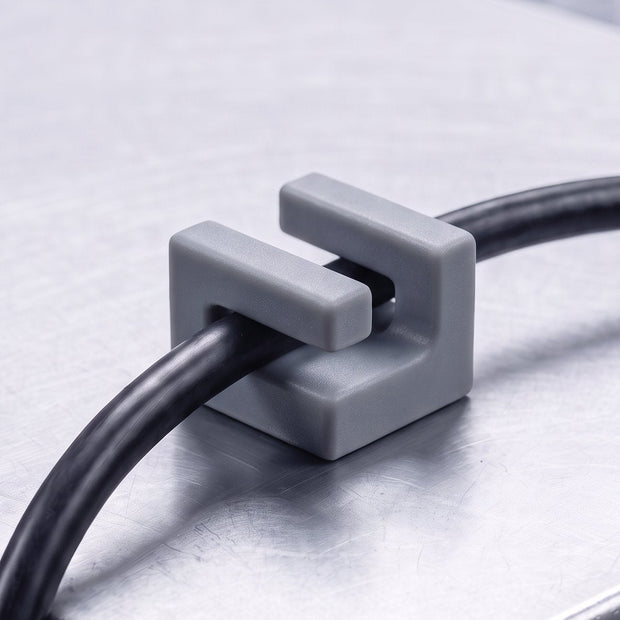 Grey Cable Mag holding a cable